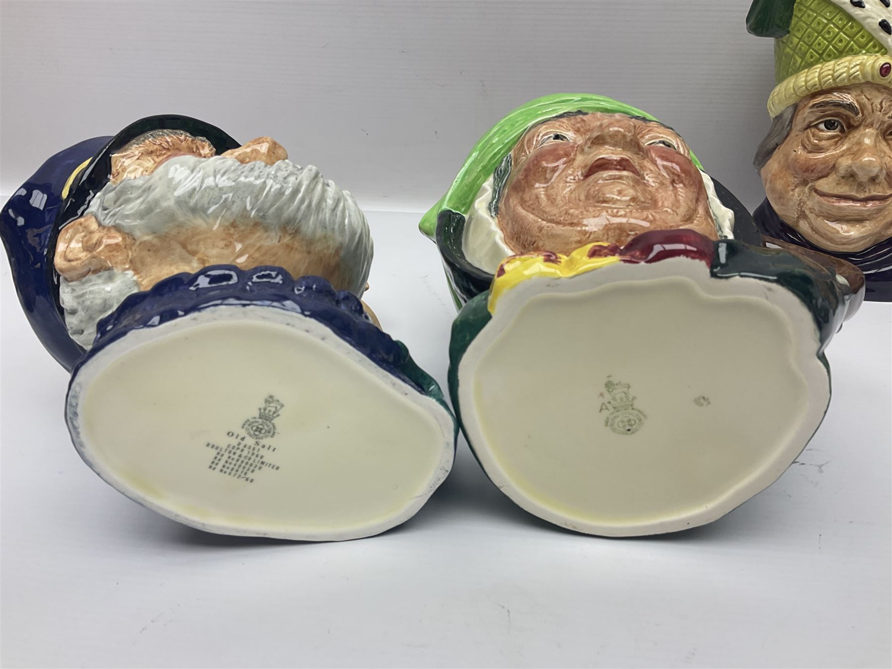Twenty two Royal Doulton toby and character jugs, including Ugly Duchess D6599, Old Salt D6551, The Walrus & Carpenter D6600, Robin Hood D6534