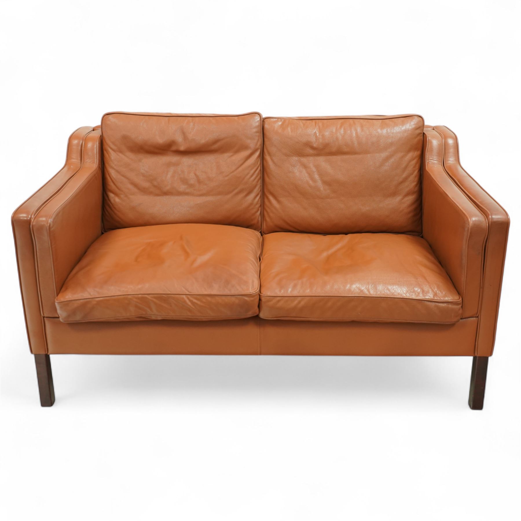 Stouby - Danish design two-seater sofa, upholstered in tan leather with loose cushions and square tapering stained hardwood legs