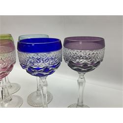 Set of six Harlequin coloured glass hock glasses, each with a band of hobnail decoration, upon faceted stems, H19.5cm