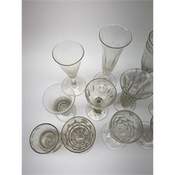 A group of early 19th century and later drinking glasses, to include two toastmaster type examples with deceptive bowls, together with a Bonnet glass or monteith, probably late 18th century. 