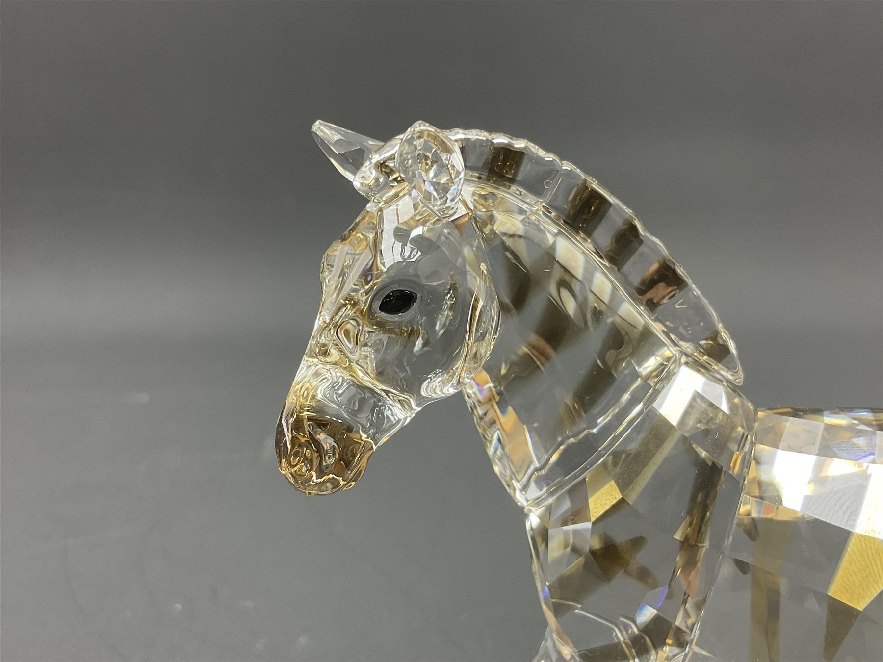 Swarovski Crsytal Society coloured animals, comprising zebra, giraffe and water buffalo, tallest H17.5cm