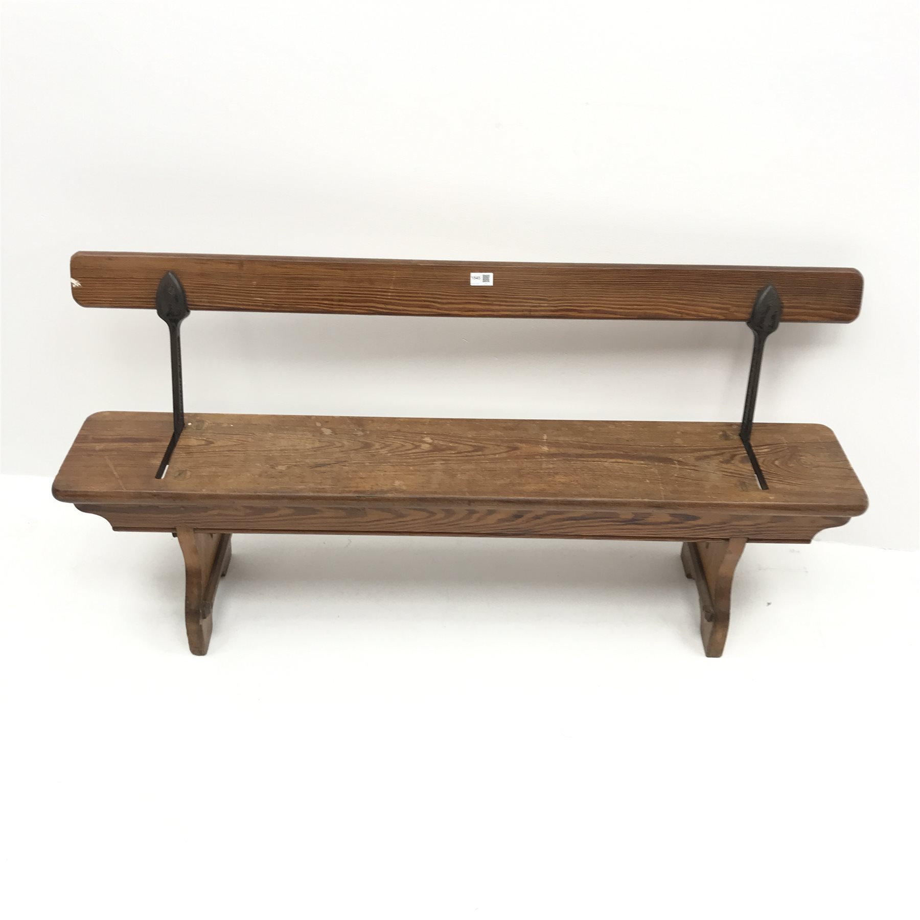 H Addison & Co Wellington Salop pitch pine and wrought metal reversible bench, W138cm