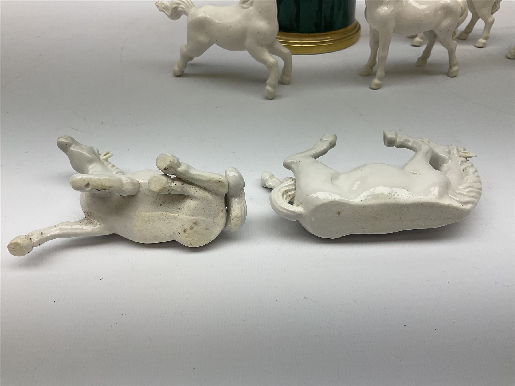 Portmeirion Malachite pattern jar and cover designed by Susan Williams-Ellis, together with a eight Viennese white glazed porcelain figures, modelled as horses in various poses, in one box 