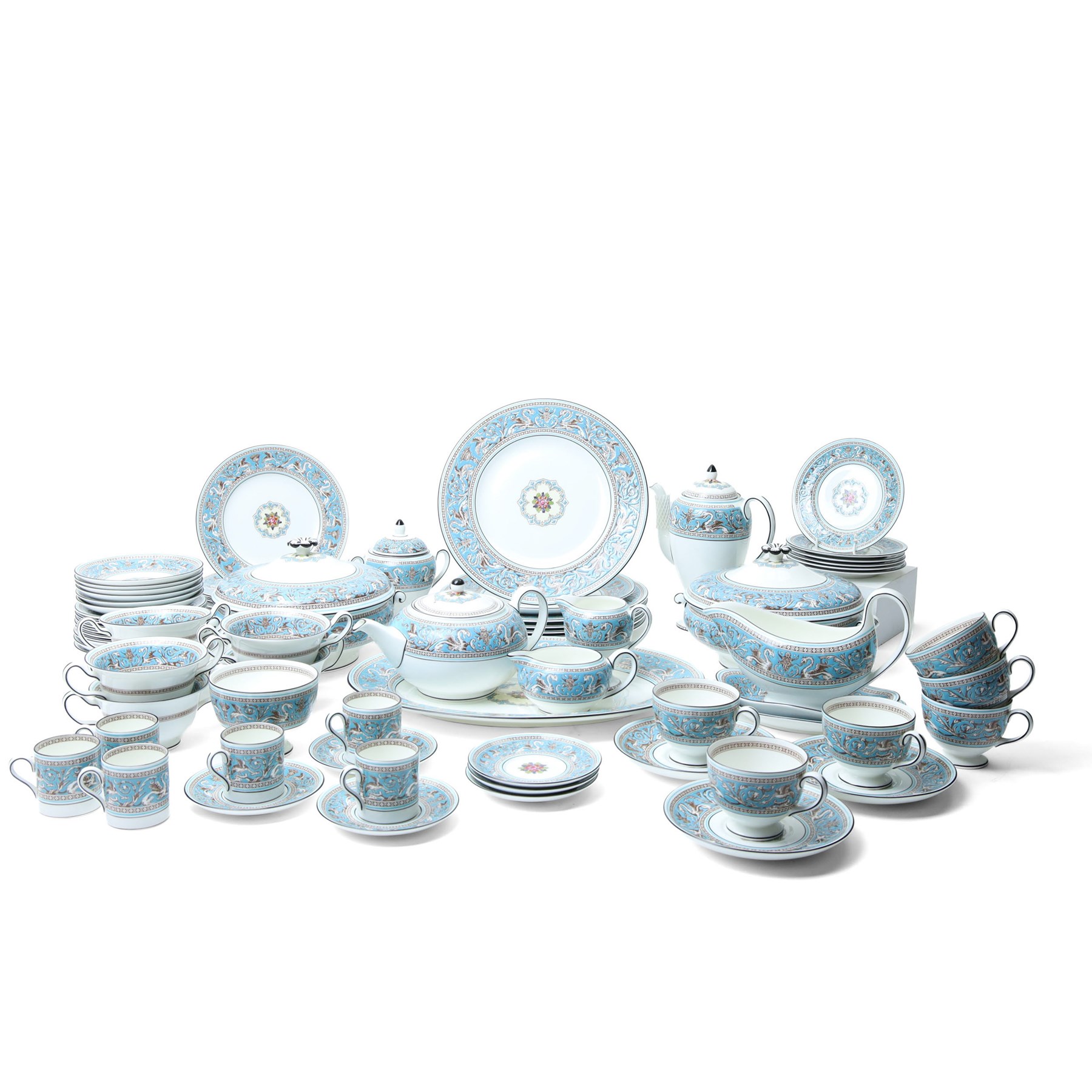 Extensive Wedgwood Turquoise Florentine part service tea, dinner and coffee service for six covers comprising six dinner plates, six dessert plates, six soup bowls and stands, pair of vegetable dishes and covers, gravy boat ad stand, oval meat plates, six tea cups and saucers, six coffee cans and saucers, six tea plates, teapot, coffee pot, sucrier and cover, sugar bowl, milk and cream jugs and cake plate, 72 pieces