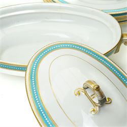 Spode Copeland's china part dinner service, circa 1900, with a blue and gilt jewelled border comprising ten dinner plates, seven dessert plates, two side plates, pair of vegetable dishes and covers, two sauce tureen stands and oval meat plate retailed by T Goode, London