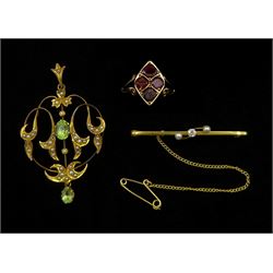 Edwardian gold peridot and seed pearl pendant, stamped 9ct, gold three stone pearl and diamond brooch, stamped 15ct and a 9ct rose gold  garnet marquise shaped ring, Chester 1903