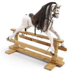Late 20th century polychrome painted rocking horse, modelled in dapple grey finish with ho...