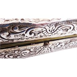 Late Victorian silver jewellery box, of rectangular form, embossed throughout with foliate scrolls, the hinged cover with vacant oval panel, hallmarked Charles Fox & Co Ltd, London 1896, H6cm W15.5cm D5.5cm, (with weighted base)