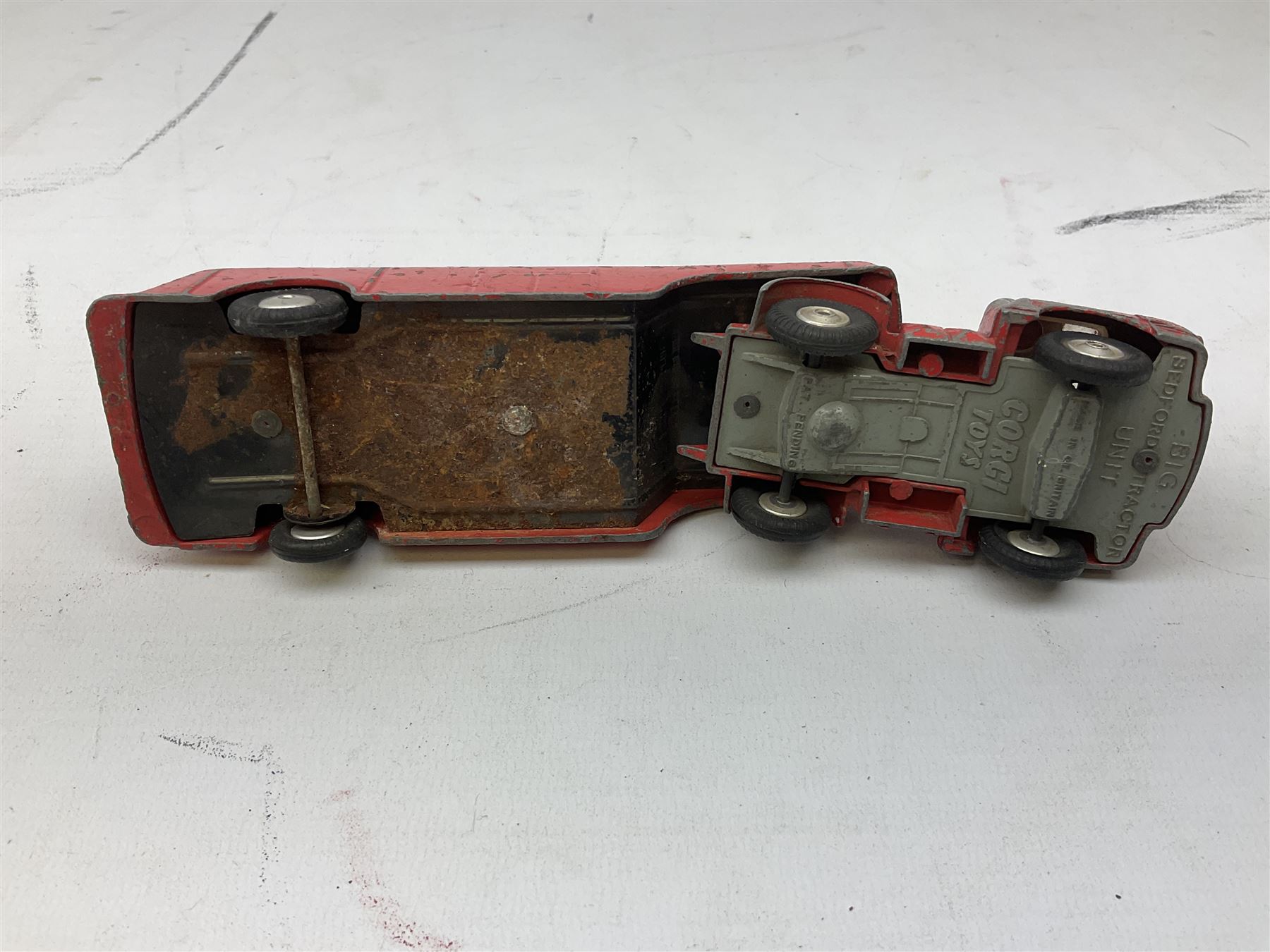 Dinky - five unboxed and playworn die-cast models comprising Supertoys Big Bedford Van 'Heinz' No.923; A.E.C. Monarch Thompson Tank; Maserati Racing Car No.231; H.W.M. Racing Car 23J; and Royal Mail Van; together with a Corgi Mobilgas Tanker (6)