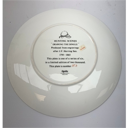  A collection of hunting related items, comprising a pair of Caverswall beakers, each with twin gilt fox head handles, H11.5cm, a limited edition Spode cabinet place depicting 'Drawing the Dingle' after J F Herring Sen, D24cm, and a set of six French shot glasses, decorated with huntsmen on horseback and hounds, H5.5cm.  