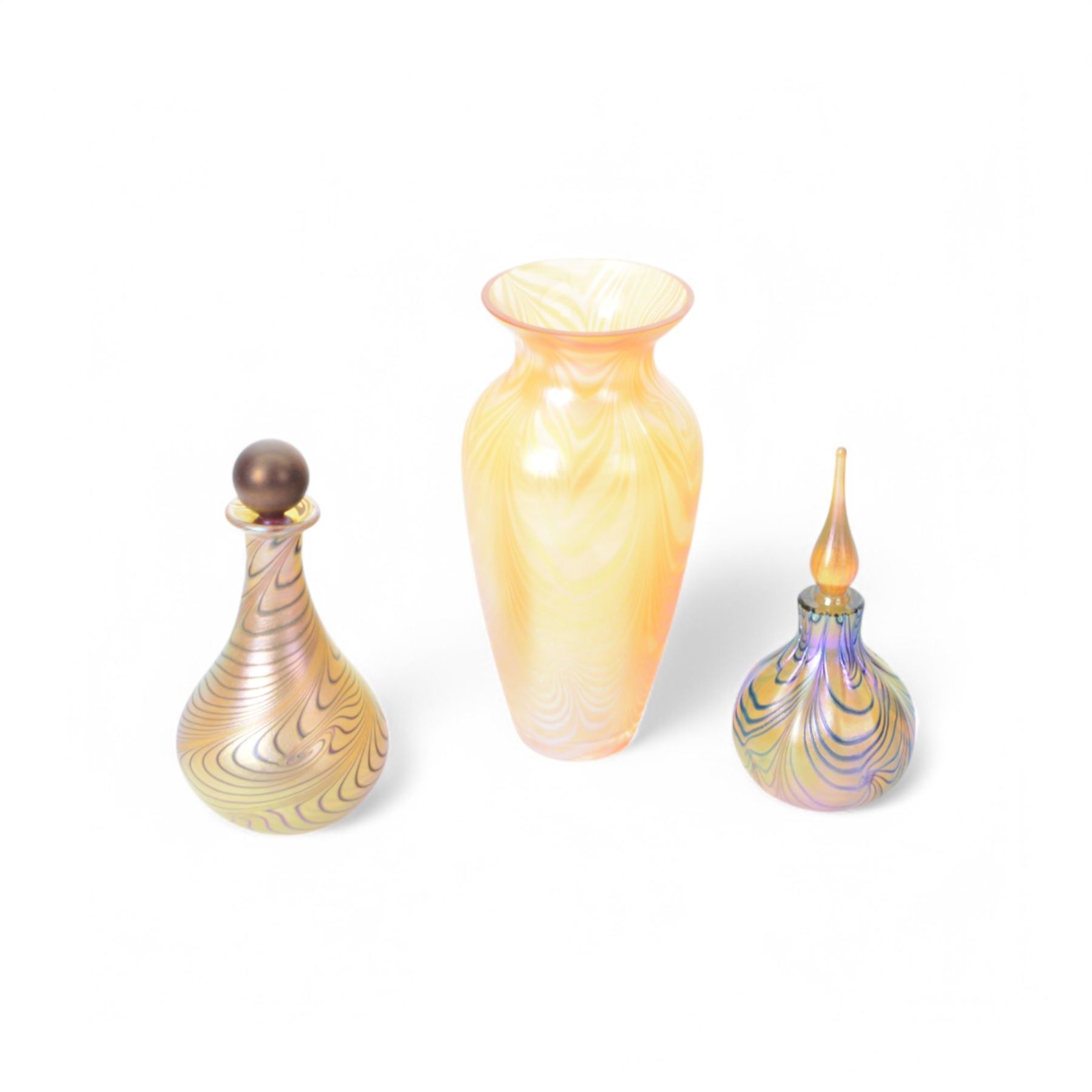 Okra glass vases, with iridescent trails upon an orange ground, together with two Okra scent bottles, all with original boxes 