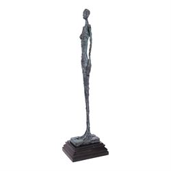 After Alberto Giacometti - Femme Venise bronze upon a stepped marble base, overall H50cm