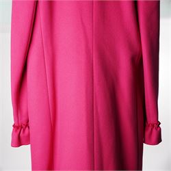 Gucci - wool ruffle-front single-breasted coat in bright fuchsia pink, with high ruffled collar, cascading ruffle trim to the front, collar and cuffs, faux pearl and gilt GG monogram logo button fastening, size 44, unused with the original garment bag and hanger