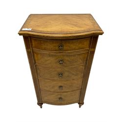 Frank Hudson - mid-20th century Mindi ash and burr walnut bow-fronted lingerie chest, crossbanded hinged top concealing vanity mirror, over five graduated cockbeaded drawers, raised on turned supports