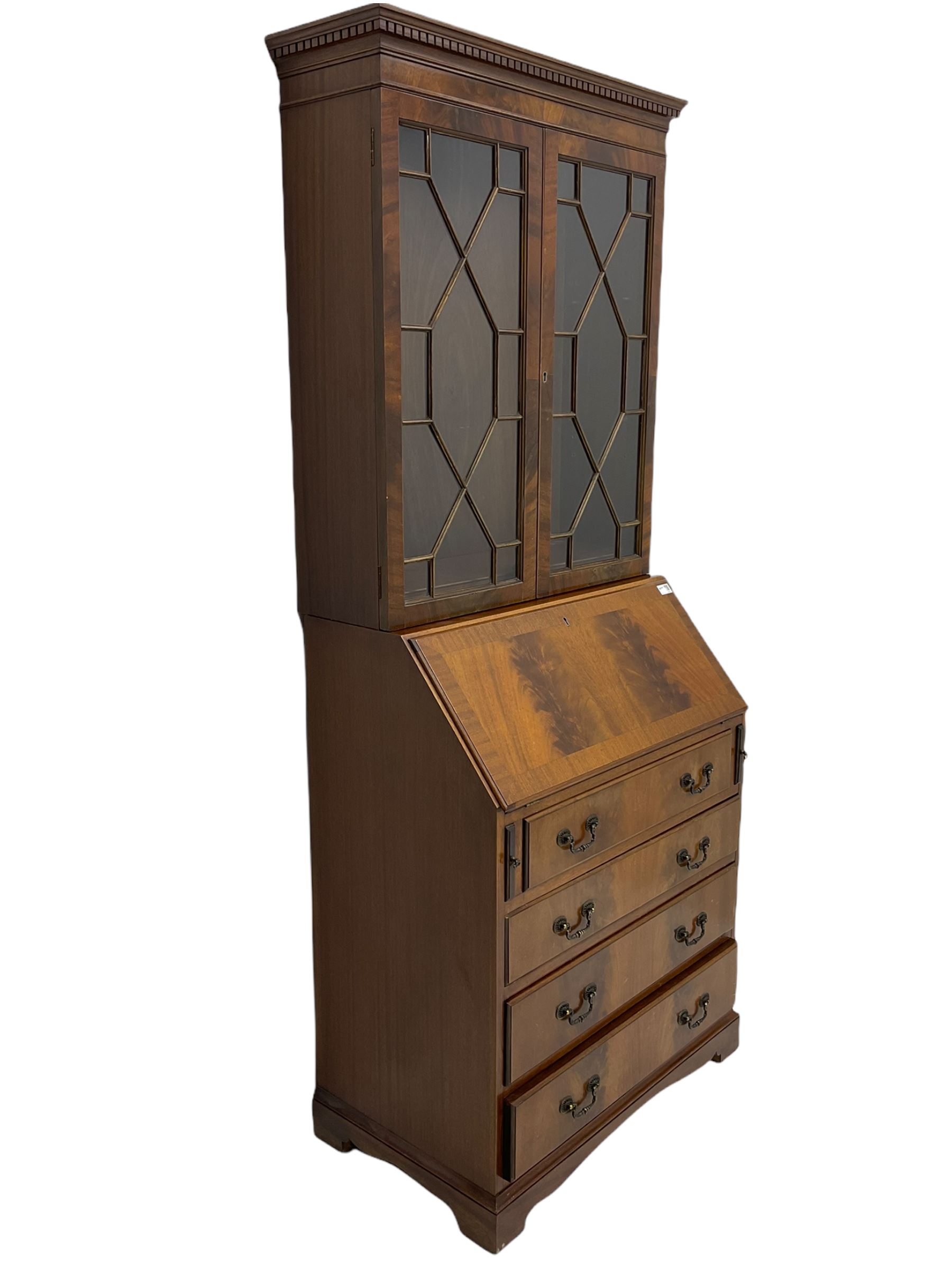 Reproduction mahogany bureau bookcase, the glazed bookcase over fall front bureau fitted with four drawers, on bracket feet