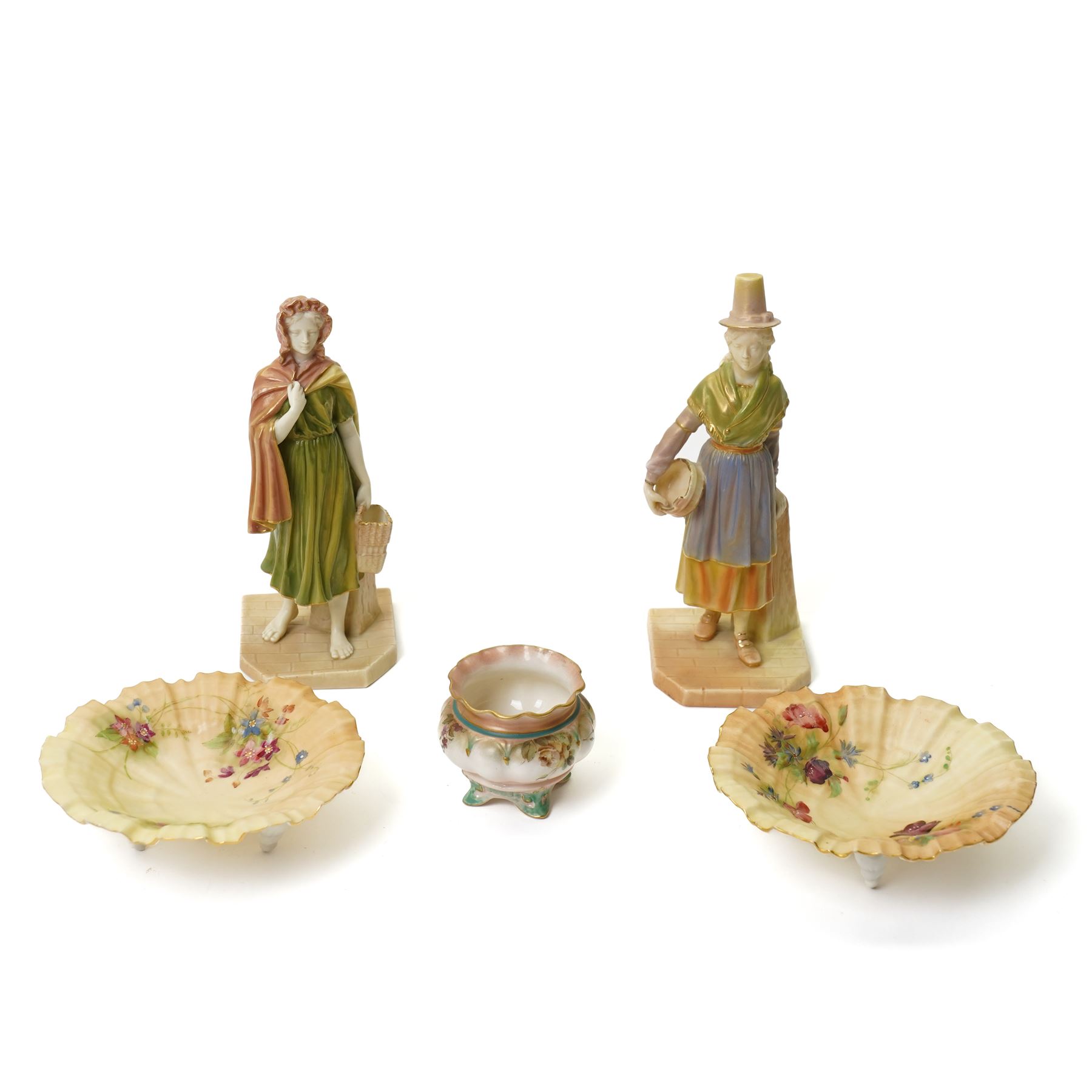 Pair of Royal Worcester blush ivory figures from the Countries of the World series 'Irish Girl' 1874 and 'Welsh Girl' 1875, pair of Royal Worcester blush ivory shallow shell dishes painted with flowers D12cm and a small Hadley's Worcester cauldron shape vase (5) 