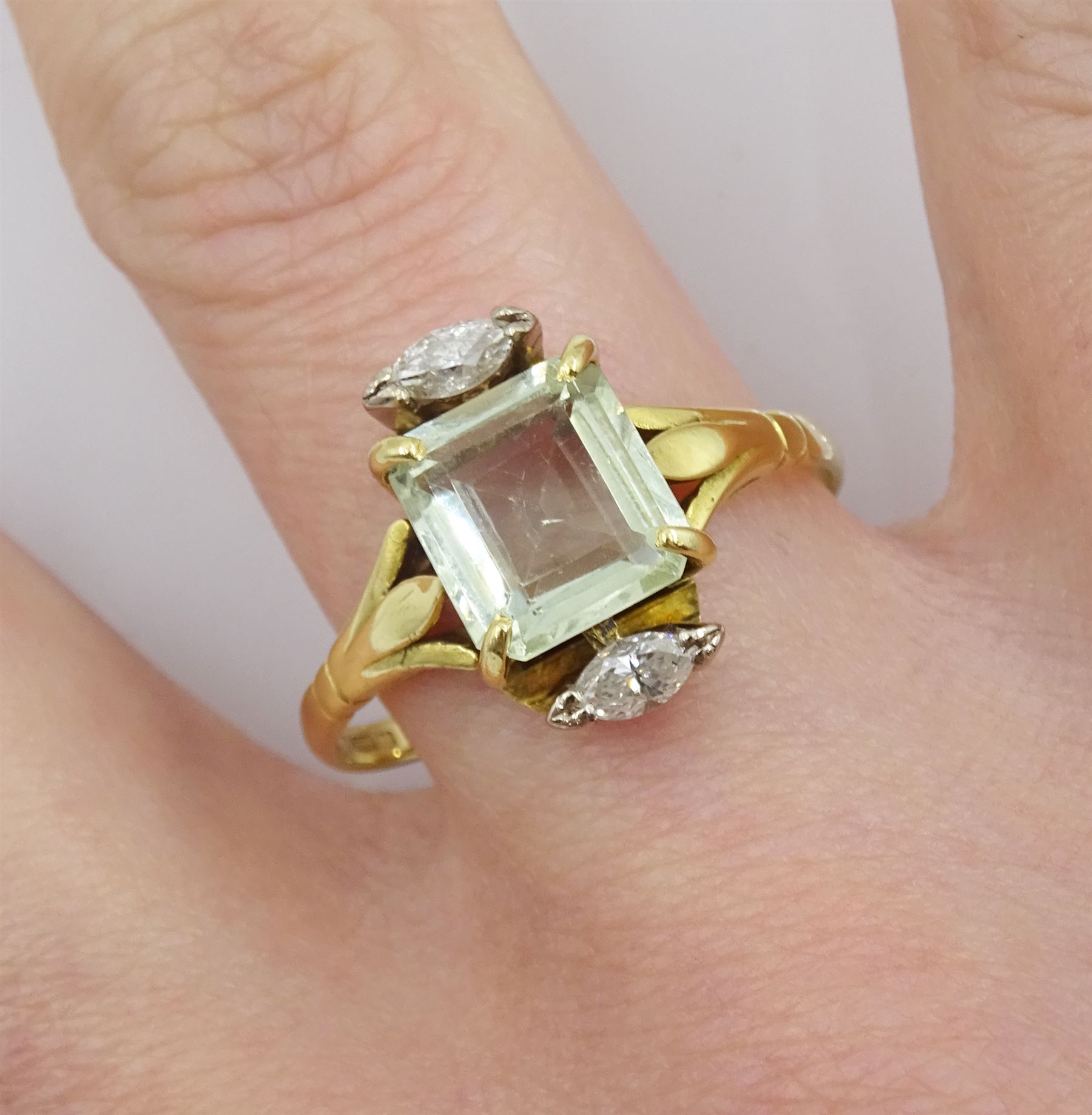 18ct gold three stone emerald cut pale green beryl and marquise shaped diamond ring, Sheffield 1995