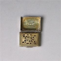 Two George III silver vinaigrettes, the first of rectangular form, the hinged cover modelled as a strap and engraved with acanthus leaves and flower heads, opening to reveal a foliate pierced gilt grille, hallmarked IT, Birmingham 1792, W2.5cm, the second of oval form, the hinged cover engraved 'C M Church' within a foliate border, opening to reveal diamond pierced gilt grille, hallmarked Cocks & Bettridge, Birmingham 1805, W2.5cm