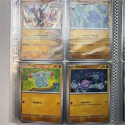 Collection of modern Pokemon TCG trading cards from the Scarlet & Violet and Sword & Shield eras, contained within in two folders, opened packets and loose, together with a graded Sword & Shield Silver Tempest Passiman TG08, GET Graded 9 Mint, two oversized cards, energy cards, vintage booklets and boxes, empty tins, 1998 Electronic Pokédex and other accessories