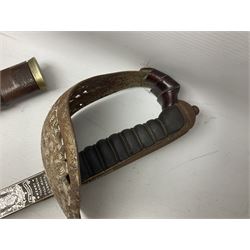 George V 1897 pattern Army Officer's sword by Henry Wilkinson Pall Mall London, the 82.5cm 'London Made' blade etched to both sides with Royal Crests and cyphers etc, pierced half-basket hilt with wire-bound fish skin grip and remains of leather knot strap; in leather covered field service scabbard L101cm overall; and two 14th Prince of Wales Own swagger sticks (3)