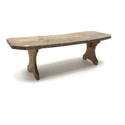 Mid to late century waney edge elm coffee table, arched solid end supports, W136cm, H43cm, D51cm