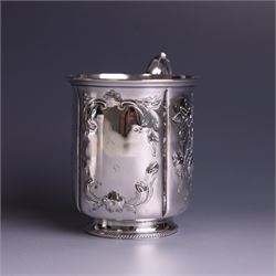 Victorian silver christerning mug, of cylindrical form with four panels of embossed floral decoration, hallmarked H J Lias & Son, London 1876, H10cm