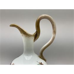 Victorian Aesthetic movement milk glass ewer, the body hand painted with an exotic bird upon a cured branch, the rim, handle and base with remnants of gilt, with painted numbers beneath, H35.5cm