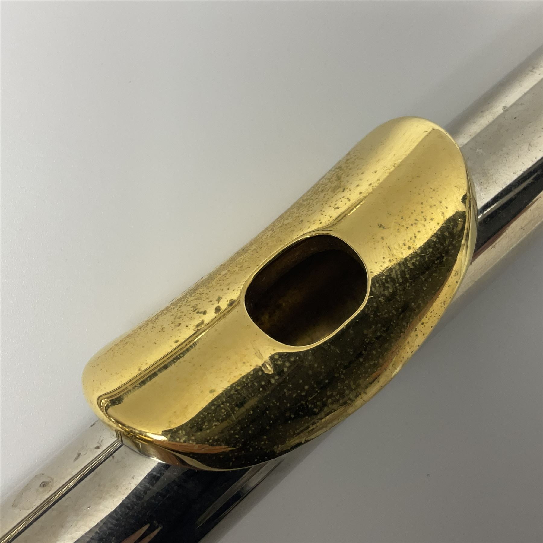 Earlham silver plated three-piece flute, serial no.940562; in fitted carrying case