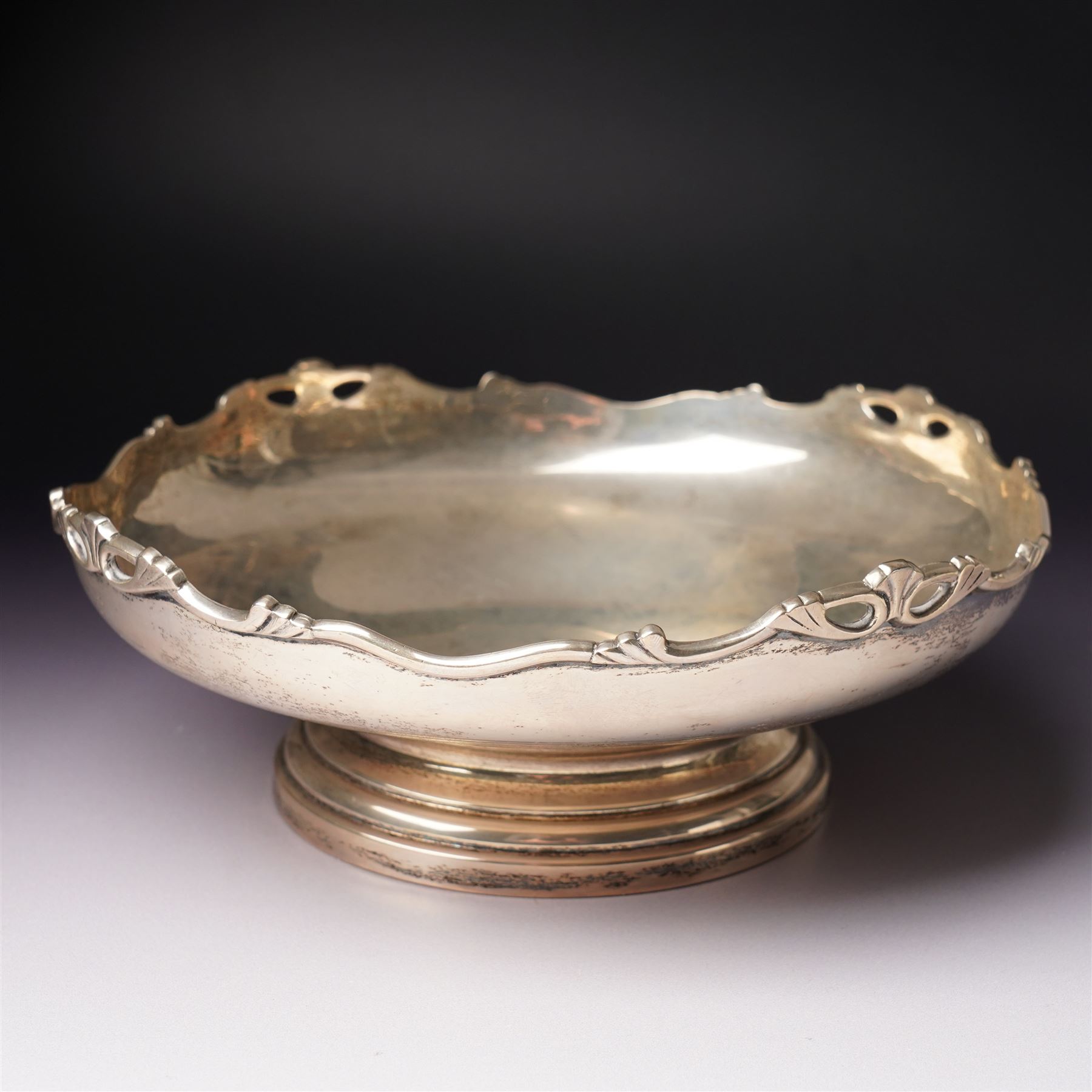 Silver circular fruit bowl with pierced border and pedestal foot D21cm Birmingham 1939 Maker Roberts & Dore Ltd