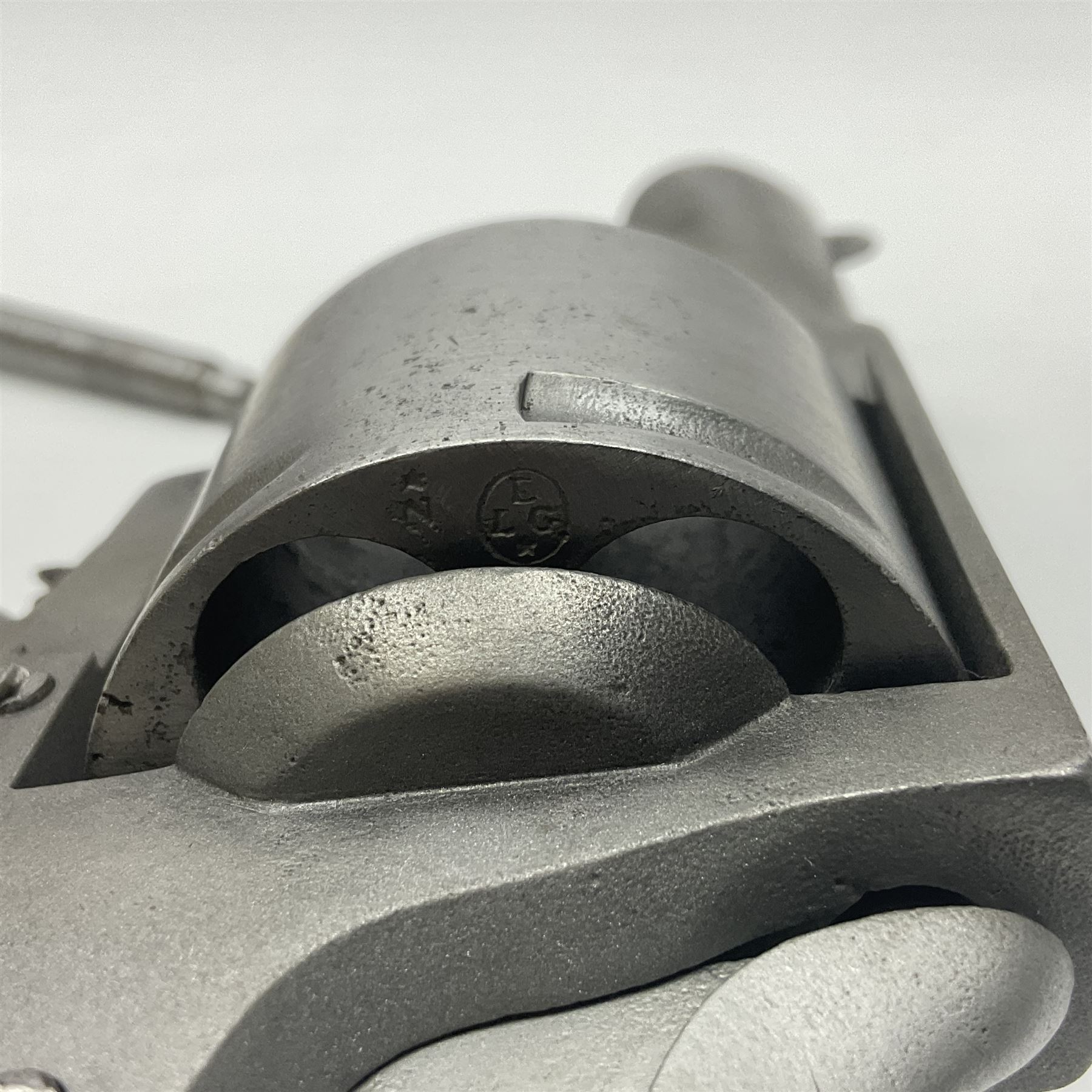 The major parts only of a British Bull-Dog .500 Boxer five-shot revolver comprising stripped down framework, cylinder, trigger with guard, functioning hammer and two-piece chequered grip; retailed by G. Goth Buenos Ayres; Belgian proof marks; L19.5cm overall; in fitted mahogany case 