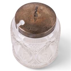 Silver egg cup, pepper shaker and cut glass jar with silver lid, all hallmarked