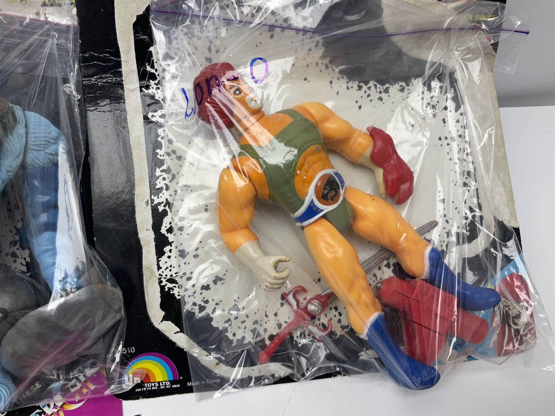 Five 1980s LJN Thundercats figures - Lion-O with sword, Snowman, S-S-Slythe, Tygra and Mumm-Ra; all re-bagged on original backing cards; partially stocked Panini sticker album; story cassette tape and three catalogues; together with Ghostbusters Slimer with food and Comic