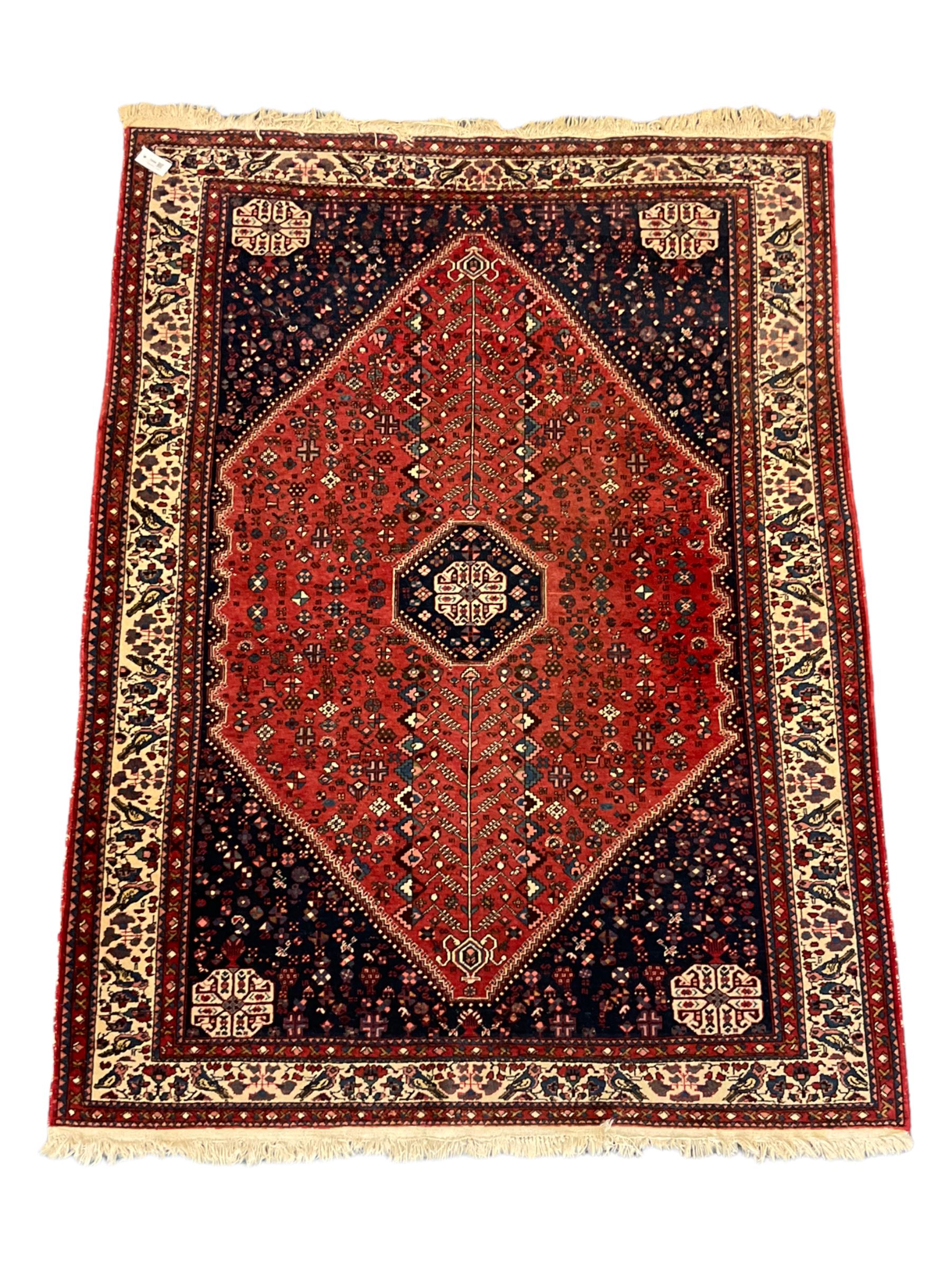 Fine Persian blue and red ground woollen rug