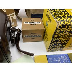 Cameras and accessories including Nikon Nikkormat camera with ‘Nikkor-H 1:2 f=50mm’ lens, Olympus C-8080 wide zoom digital camera, soft case camera bag etc, all untested, in one box