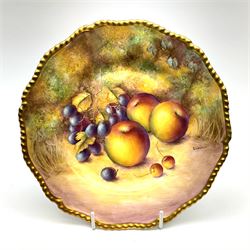 A Royal Worcester fruit painted cabinet plate, hand painted with apples and grapes against a mossy ground, signed S Weston, black printed mark beneath, D27cm