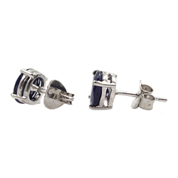 Pair of silver oval sapphire stud earrings, stamped 925