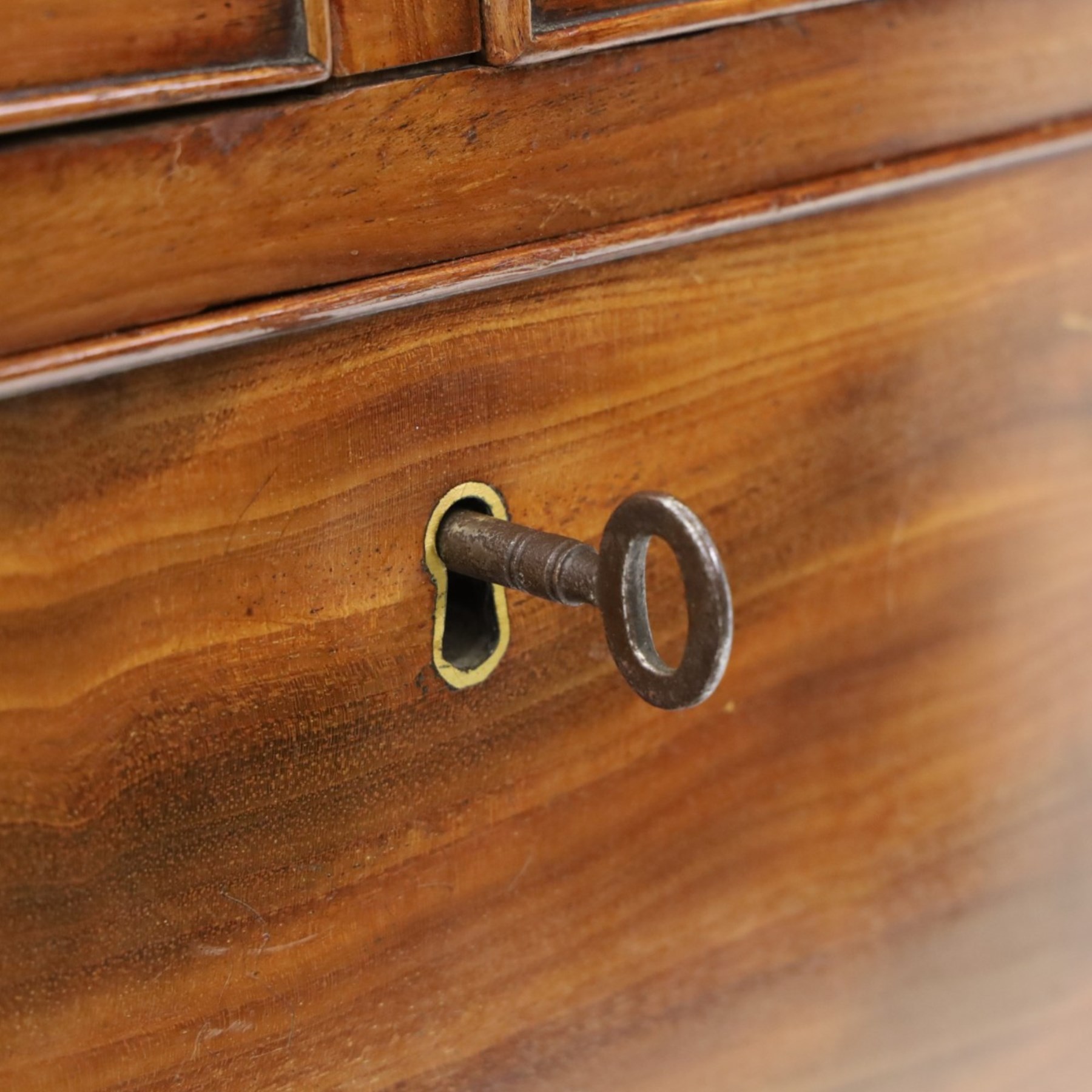 19th century mahogany bow-front chest, shaped top with ebony strung edge over banded frieze, fitted with two short over three long cock-beaded drawers, on turned feet
