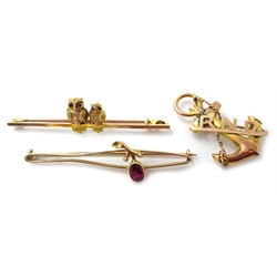 9ct gold bar brooch set with two owls, Victorian 9ct gold anchor brooch with initials R.N.D. and a garnet bar brooch stamped 9
