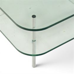 Contemporary glass coffee table with chrome supports