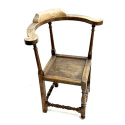 19th century elm and oak corner chair, scrolling rail into arms, bobbin turned supports and stretchers
