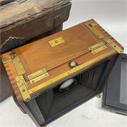 Sanderson Koilos folding plate camera in mahogany and lacquered brass, with 'Ensign Anastigmat Series IV No 2' lens, serial no 173998, with original leather case