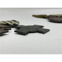 Four French medals - St. Helena medal with bust of Napoleon to obverse and inscription to reverse 'Campagnes de 1792 a 1815. A ses compagnons de gloire sa derniere pensée Ste. Hélène 5 Mai 1821', established by Emperor Napoleon III in 1857; two WW2 Croix-de-Guerre; and WW2 Croix-du-Combattant; all with ribbons (4)