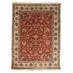 Persian Tabriz hand-knotted carpet, crimson field densely decorated with scrolling floral ...