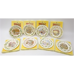  Eight Royal Doulton Brambly Hedge plates: The Oak Palace,  The Store Stump, Crabapple Cottage, The Entertainment, The Dairy, Candlelight Supper, The Discovery and The Snow Ball, all boxed (8)  