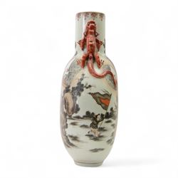 Chinese Republic period porcelain moon flask vase, of typical compressed spherical form, the neck and shoulders with applied iron red dragon handles, the body decorated in iron-red and grisaille with a 'one hundred children' design, depicting various children at play and engaged in musical pursuits within a garden setting, with apocryphal Qianlong mark beneath, H47cm