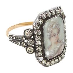 19th century 18ct gold and silver paste set portrait ring, octagonal miniature of a woman on ivory, under a glazed panel, with paste stone surround, to bifurcated paste set shoulders. This lot has been registered for sale under Section 10 of the APHA Ivory Act