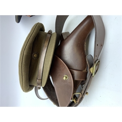 Scots Guards - two officer's peaked caps with chin strap and side buttons, one with badge, and blue dress peaked cap marked HEB for Harold Ellett-Brown; two Artist Rifles and one West Yorkshire cap badges and two Scots Guards shoulder flashes; officer's brown leather Sam Brown belt with shoulder brace strap and revolver holster; officer's Orilux trench torch etc