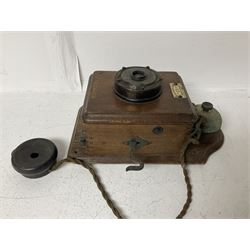 Two Hunningscone patent wall mounting telephones in walnut casing, together with Sterling Telephone & Electric Co. Ltd early wall-mounted telephone 'Primax' and one other 
