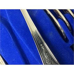 Bestecke Solingen canteen of gold plated cutlery for twelve place settings, including ladle, cake slice, fish servers, fish knives and forks, 108 pieces total, contained within a briefcase 