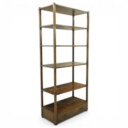 Late 20th century mahogany open bookcase, rectangular form with five open shelves and brass mounted corner brackets, fitted with single lower drawer with recessed brass campaign handles, on block feet